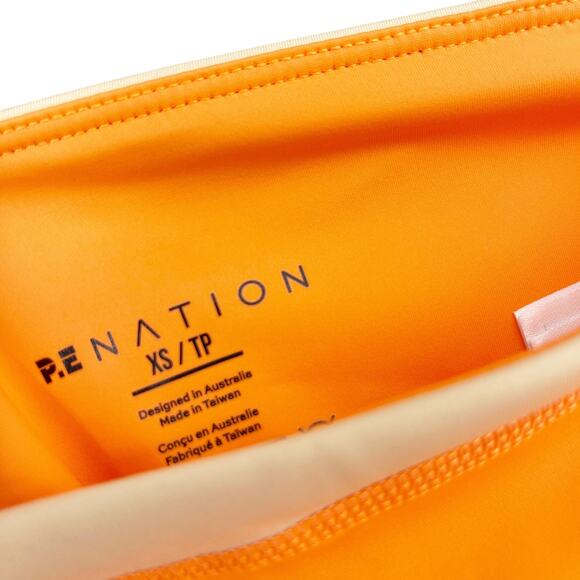 P.E Nation Uprise Legging in Nectarine SIze XS NWT Yoga Pilates Princess - Picture 6 of 12